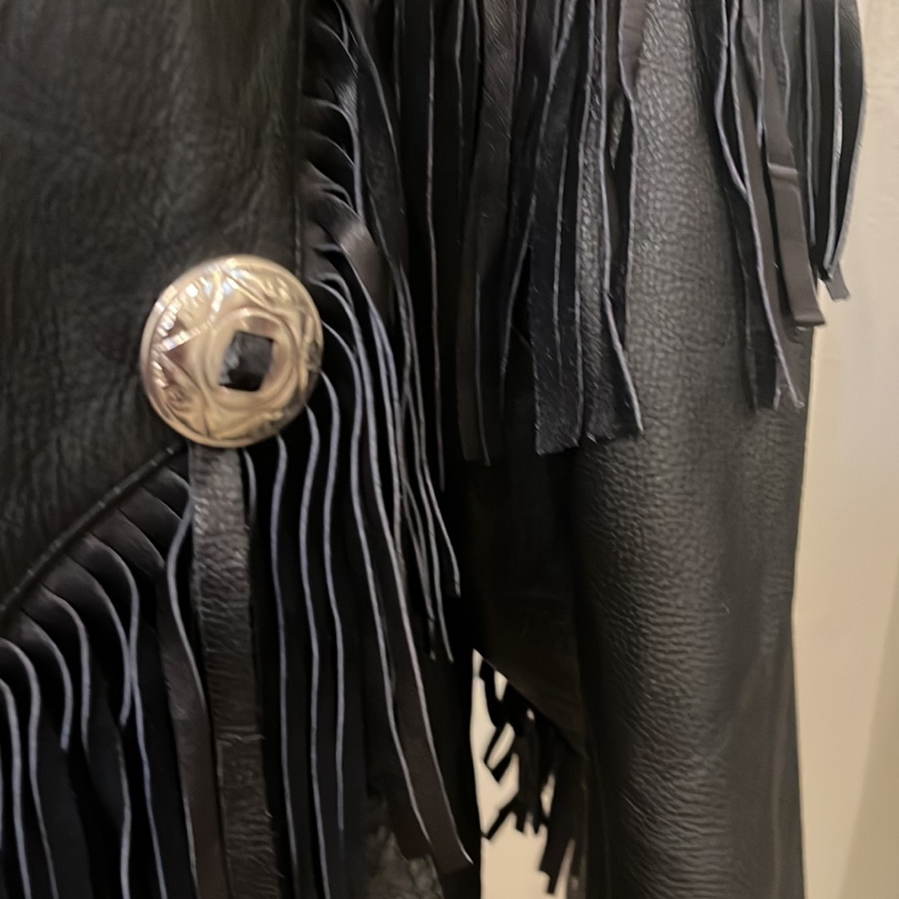 Black leather jacket with fringe